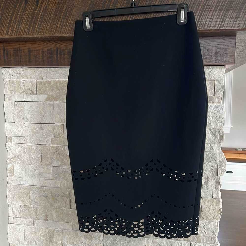 Elizabeth&James pencil skirt with cut out bottom detailing. Back slit Size 6